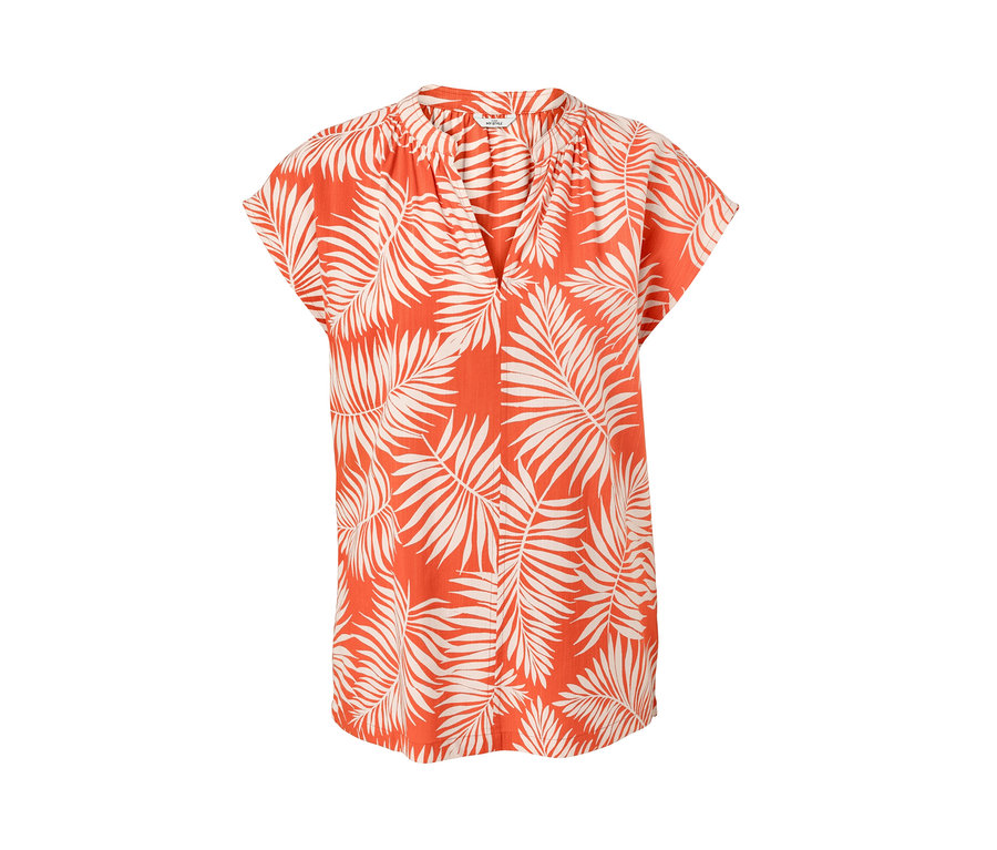 Pomarańczowa bluzka z krótkim rękawem we wzór liści.