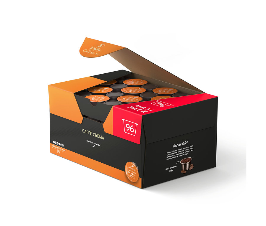Otwarte czarno-pomarańczowe opakowanie 96 kapsułek kawy Tchibo Cafissimo Caffe Crema Rich Aroma.