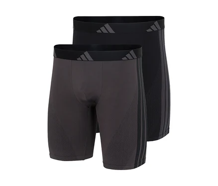 Dwie pary bokserek adidas Active Seamless Long w kolorach ciemnoszarym i czarnym, z logo adidas na pasie i trzema paskami po boku.