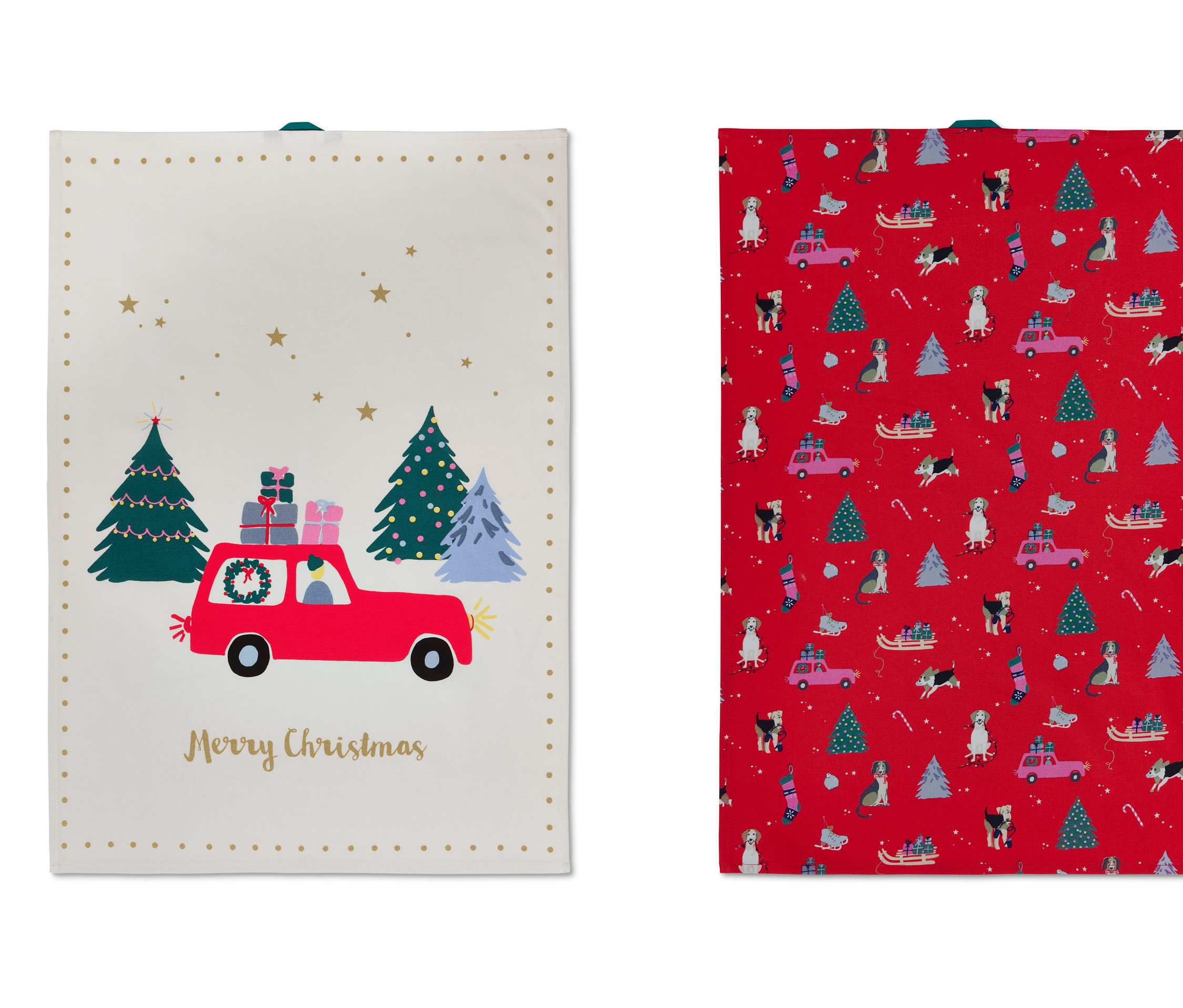 Dwie ściereczki kuchenne: jedna z czerwonym samochodem między drzewami, druga z motywami świątecznymi na czerwonym tle.
