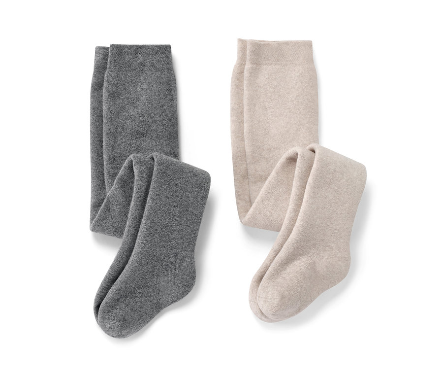 Dwie pary dziecięcych rajstop termoaktywnych melanż i dwie pary niemowlęcych rajstop termoaktywnych melanż.