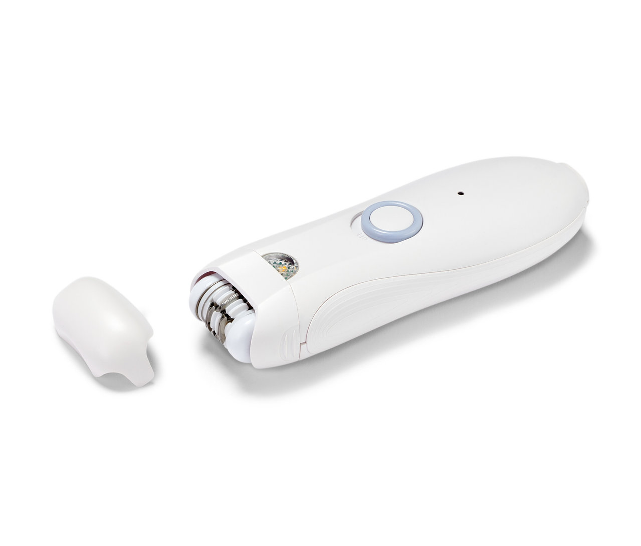 Szczegółowe ujęcie białego depilatora do twarzy z odłączaną nasadką.