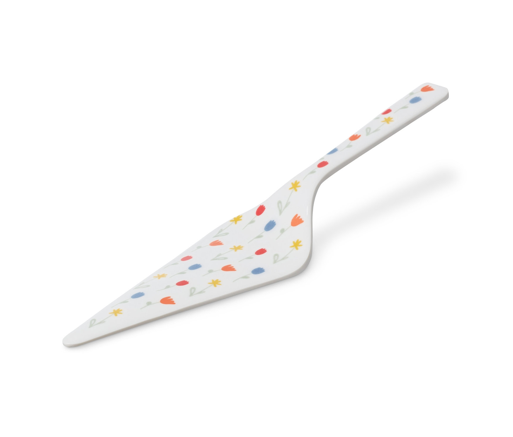 Biała łopatka do ciasta we wzory kwiatowe.