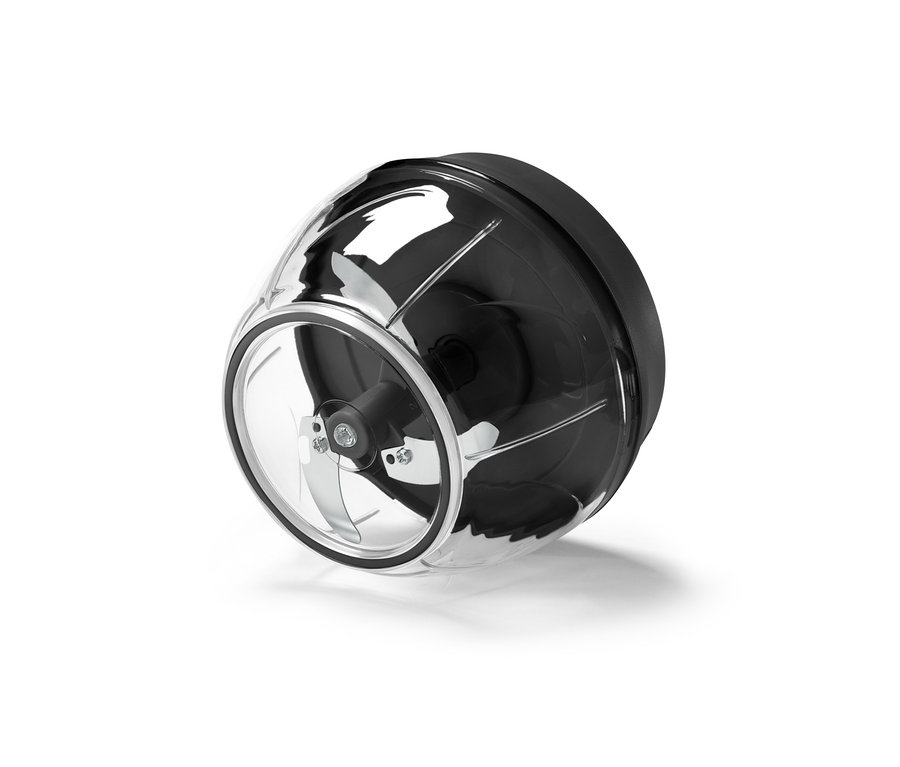 Zbliżenie na wielofunkcyjny rozdrabniacz ręczny z przezroczystym pojemnikiem i ostrzami ze stali nierdzewnej.