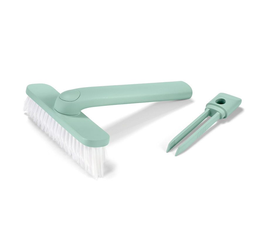 Zielona szczotka do fug 4 w 1 ze szczotką i narzędziem do usuwania zabrudzeń.