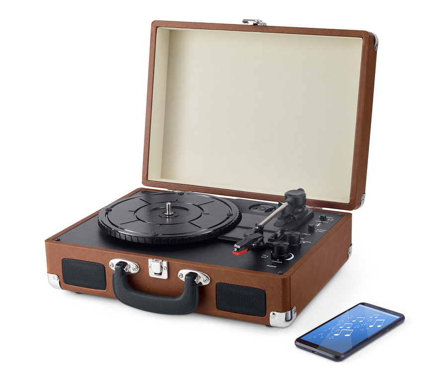Brązowy, przenośny gramofon w stylu retro z funkcją Bluetooth® i telefon komórkowy z nutami na wyświetlaczu.