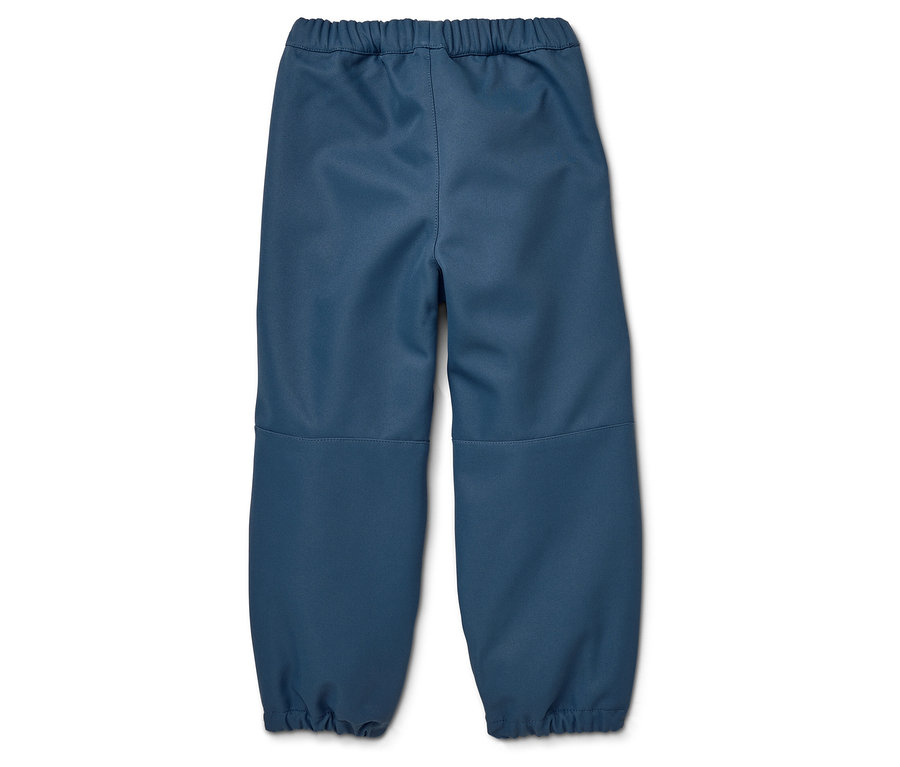 Niebieskie spodnie dziecięce na białym tle.