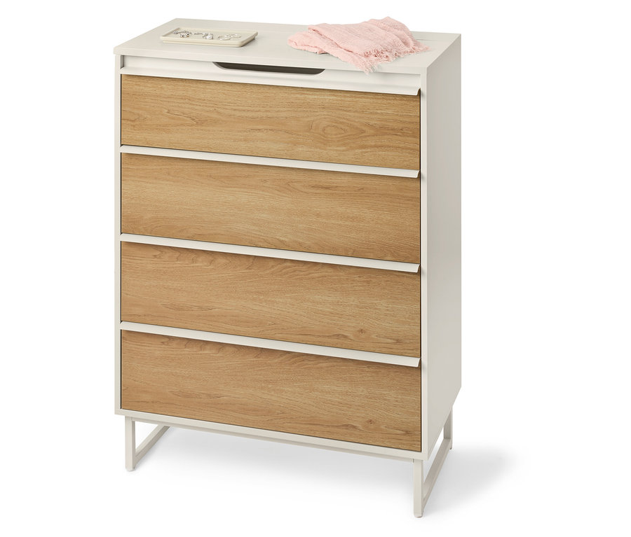 Komoda „LEEG” z 4 szufladami i lustrem stoi w pokoju.