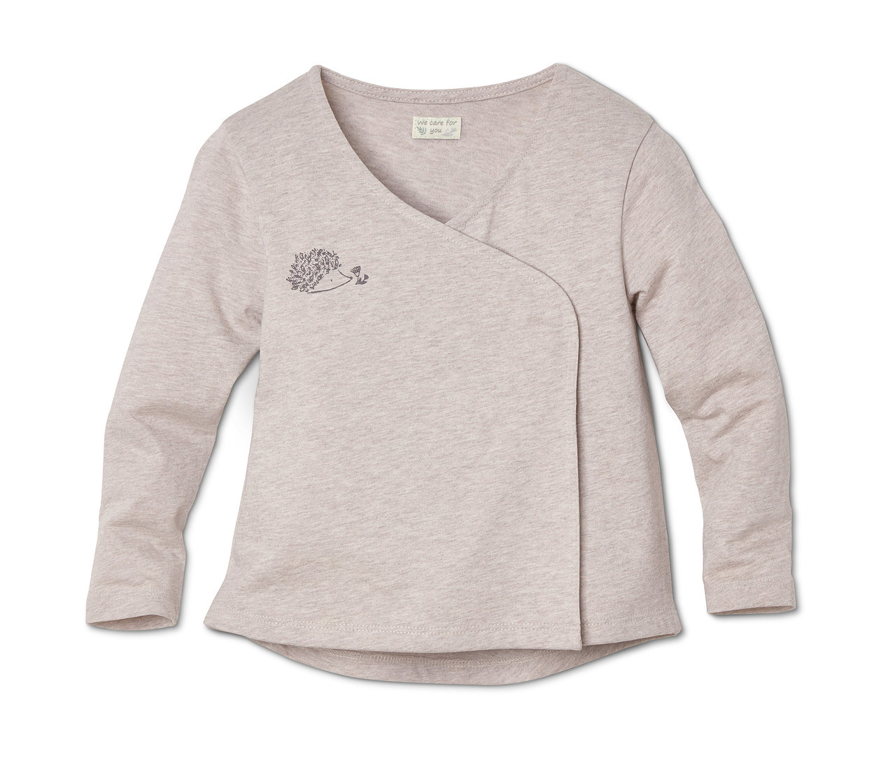 Zbliżenie dżersejowej koszulki z krojem kopertowym z dwuczęściowego zestawu.