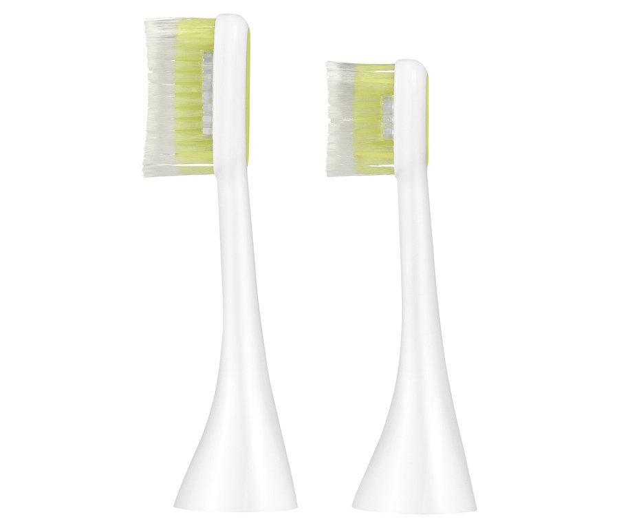 Dwie białe główki elektrycznej szczoteczki do zębów Silk'n® »ToothWave©« z białym włosiem.