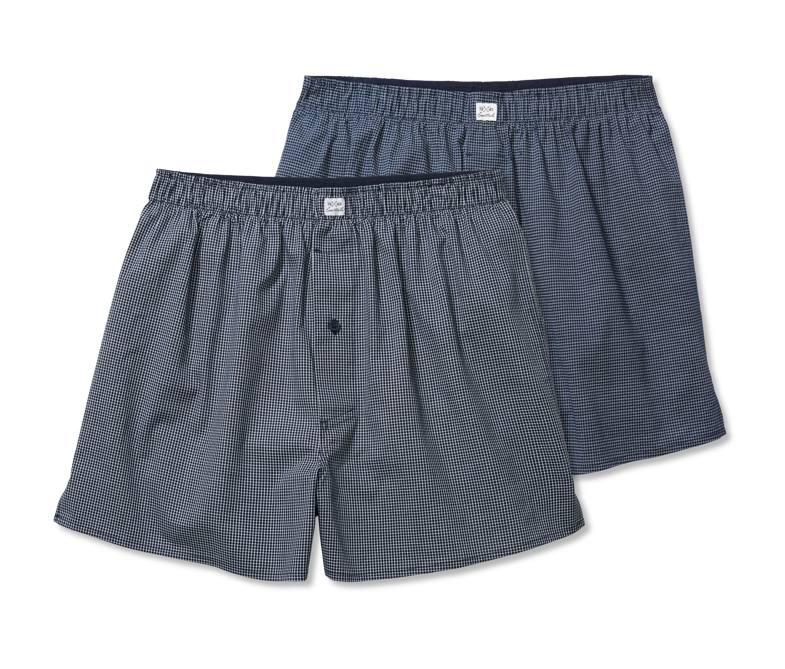 Dwie pary luźnych bokserek męskich bawełnianych w drobną kratkę.