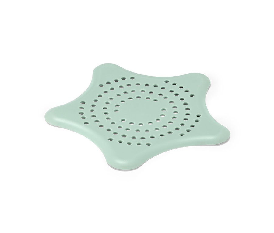 Miętowo zielone sitko do odpływu w kształcie gwiazdy.