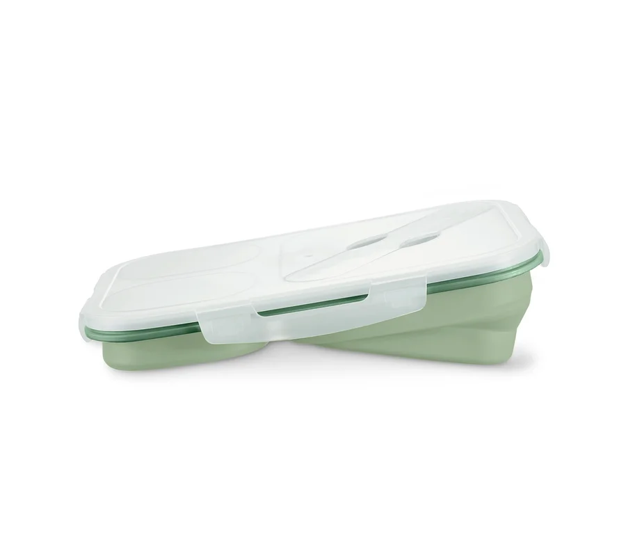 Zielony lunchbox składany z przezroczystą pokrywką.
