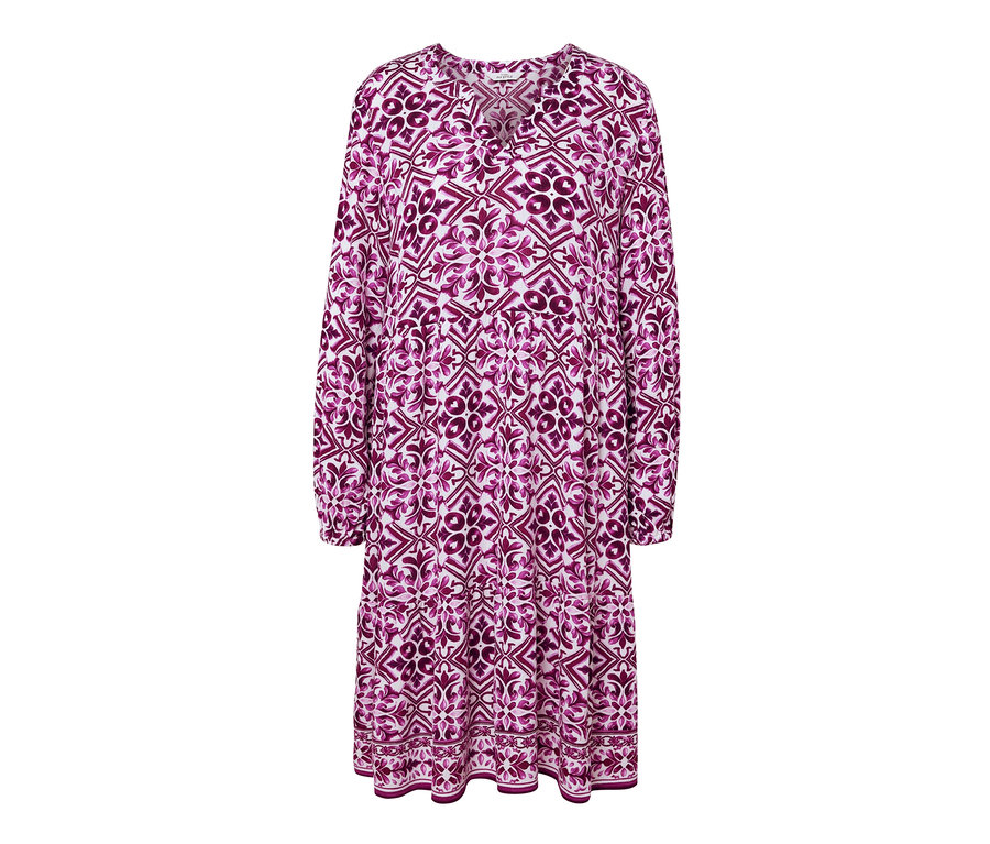 Wzorzysta sukienka z tkaniny z długimi rękawami i dekoltem w kształcie litery V.