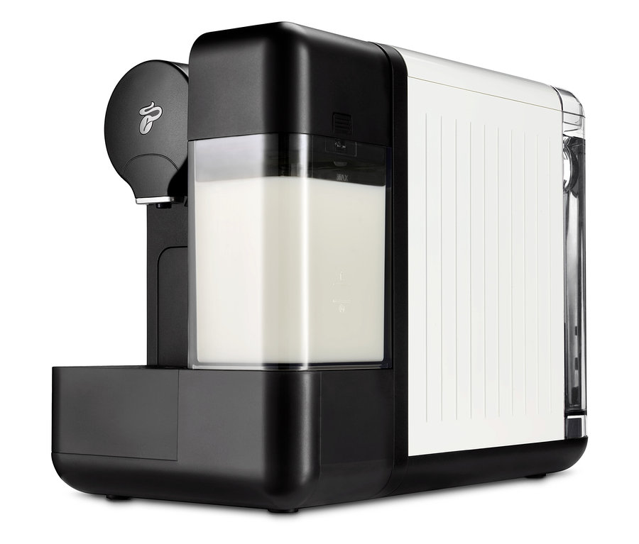 Biały ekspres do kawy Cafissimo z mlekiem.