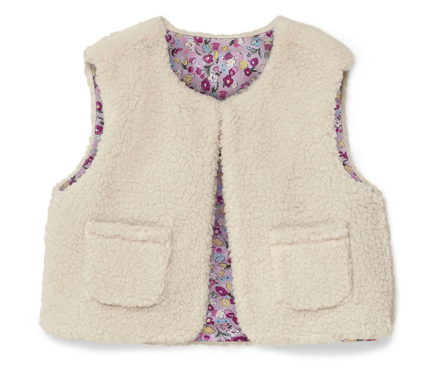 Kremowa kamizelka bez rękawów z dwiema naszytymi kieszeniami i kwiatową podszewką.