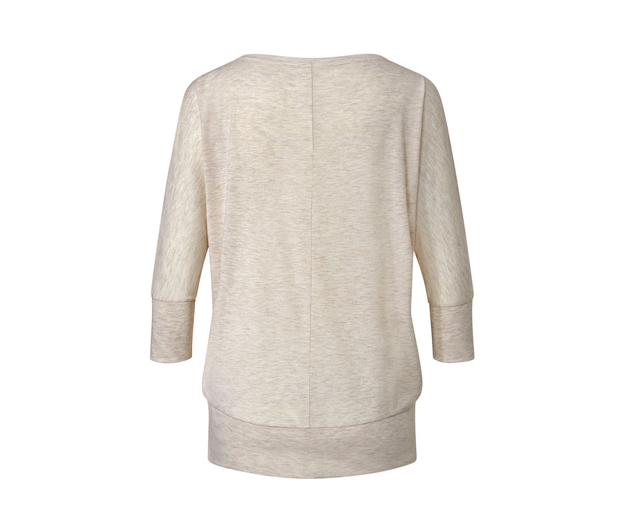 Beżowa koszulka do jogi od tyłu.