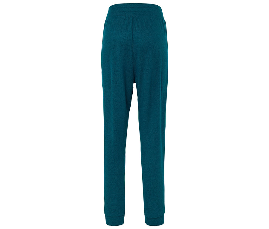 Widok z tyłu pary turkusowych spodni dresowych.