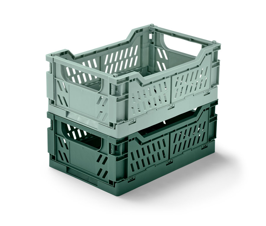 Dwa składane skrzynki do przechowywania ułożone jeden na drugim.