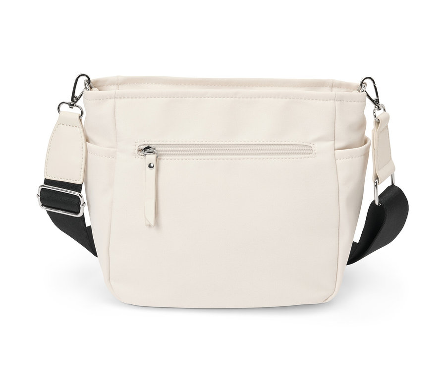 Kremowa płócienna torba na ramię z czarnym paskiem.