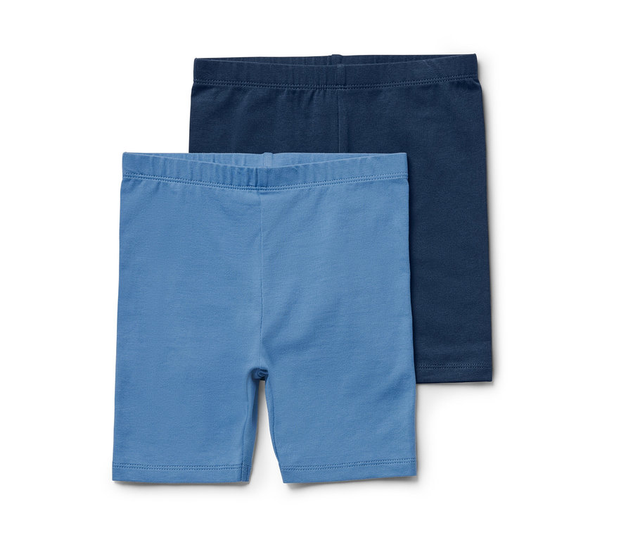 Dwie pary krótkich, niebieskich legginsów.