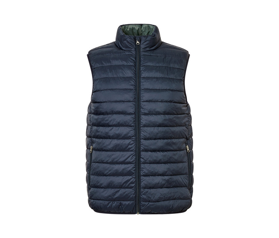 Granatowa kamizelka dwustronna z zamkiem błyskawicznym pośrodku.