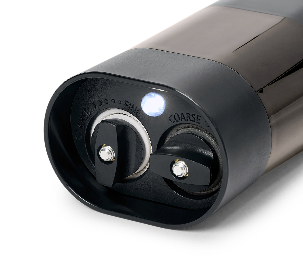 Szczegółowe zbliżenie mechanizmu młynka do przypraw z regulacją grubości mielenia.