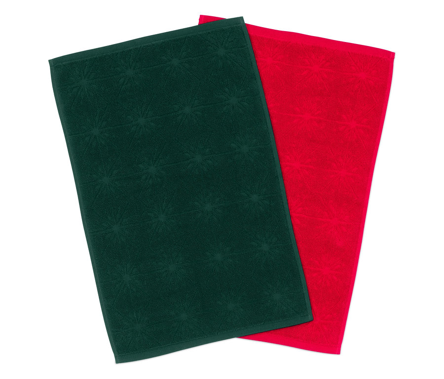 Dwa ręczniki: jeden zielony w gwiazdki, drugi czerwony.