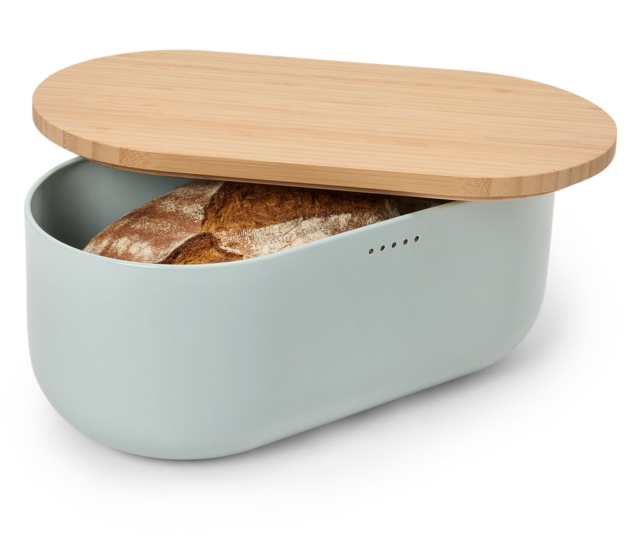 Chleb w niebiesko-szarym chlebaku z bambusową pokrywką.