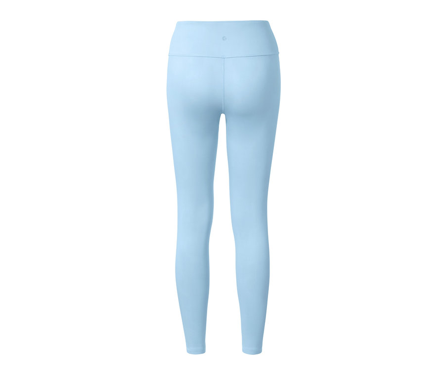 Niebieskie dwustronne legginsy sportowe widziane od tyłu.