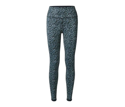Niebieskie dwustronne legginsy sportowe w kwiatowy wzór.