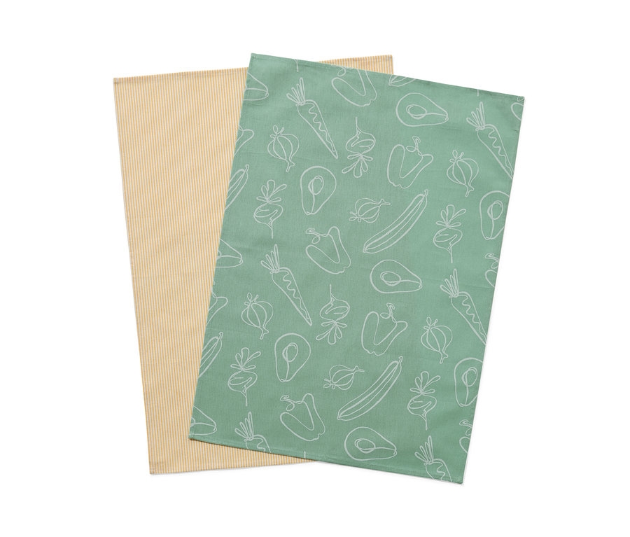 Dwie ścierki do naczyń: jedna żółta w paski, druga zielona we wzory z warzyw.