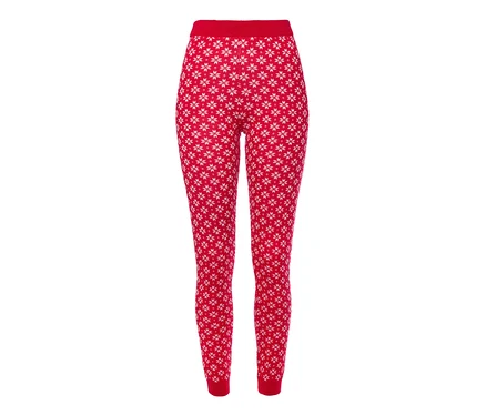 Czerwone legginsy z dzianiny z białym wzorem płatków śniegu.