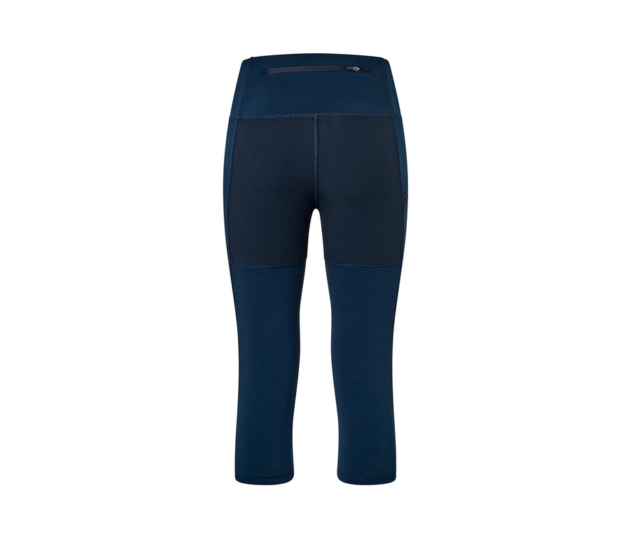 Granatowe legginsy trekkingowe o długości 3/4 widziane od tyłu.