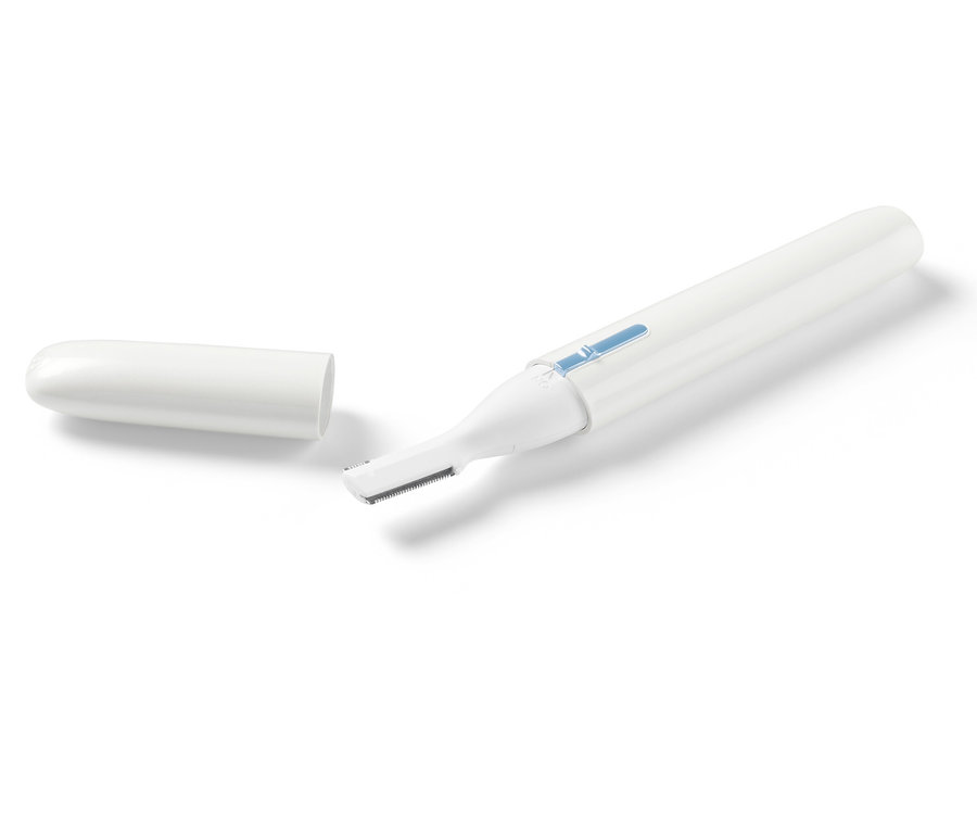 Elektryczna golarka kosmetyczna ze zdjętą nasadką.