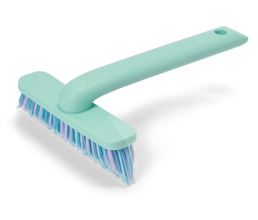 Turkusowa szczotka do szorowania z niebieskim i fioletowym włosiem.