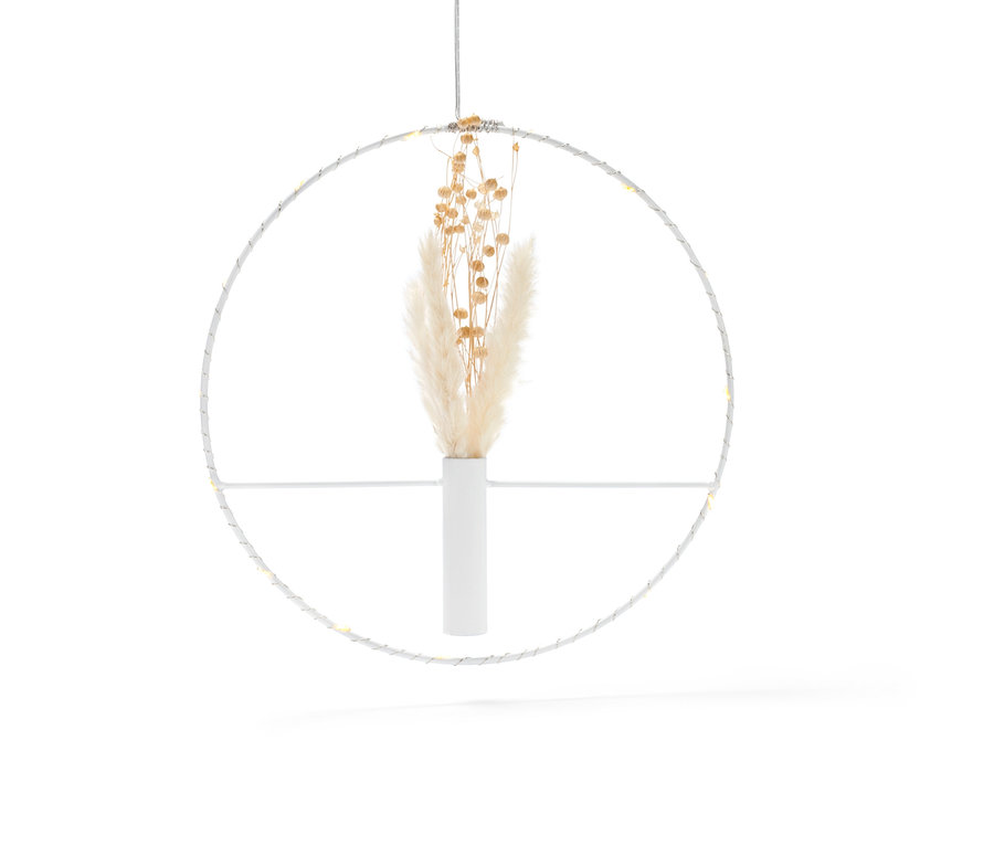 Wiszący pierścień LED z suszonymi kwiatami.