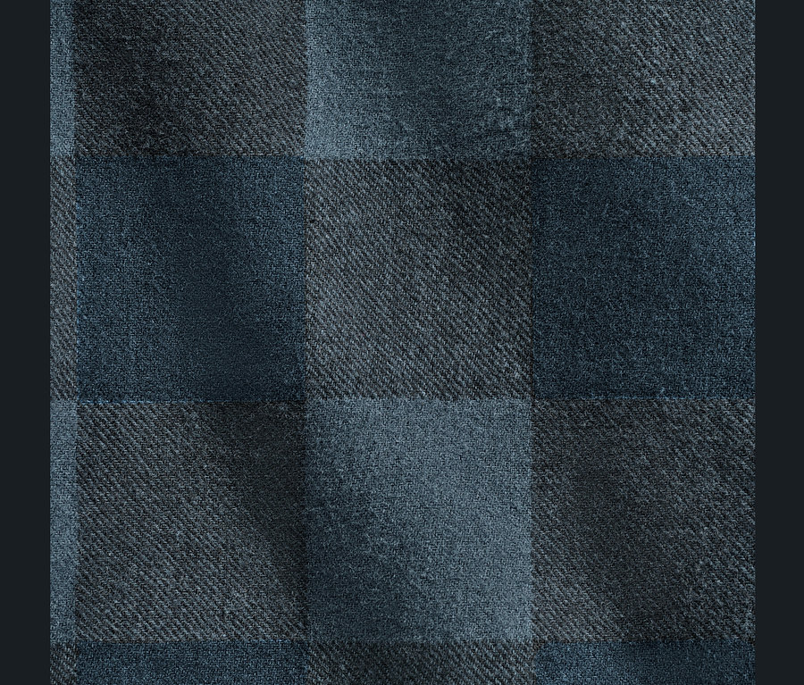 Szczegółowe ujęcie niebieskiego wzoru w kratę.