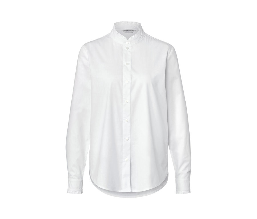 Biała bluzka z falbankami.