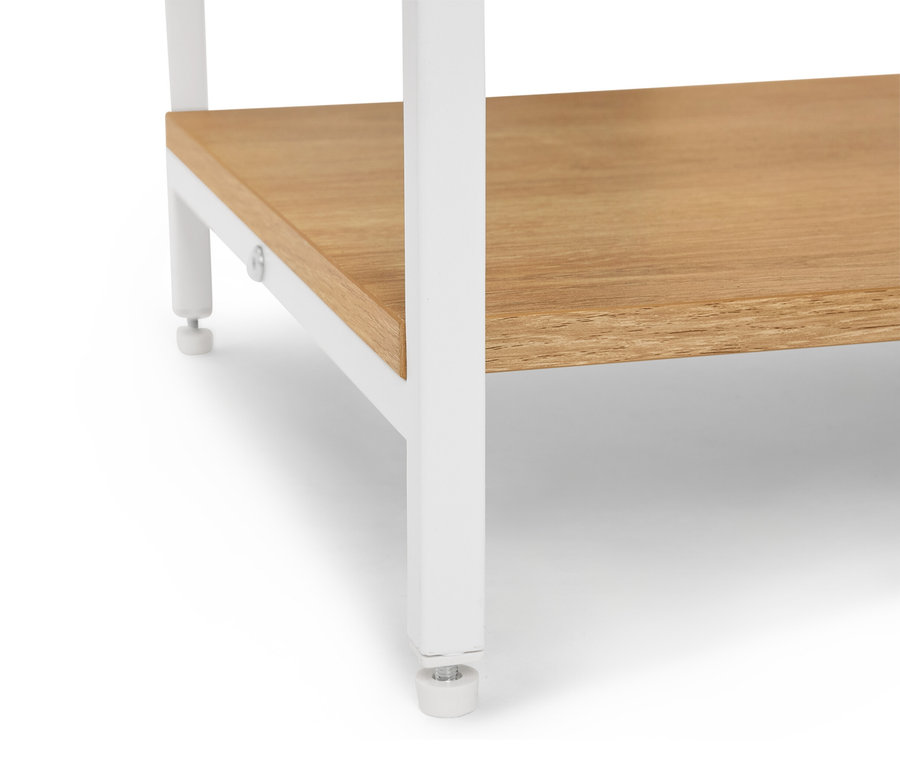 Szczegółowy widok półki z drewnianą półką i białymi nogami.