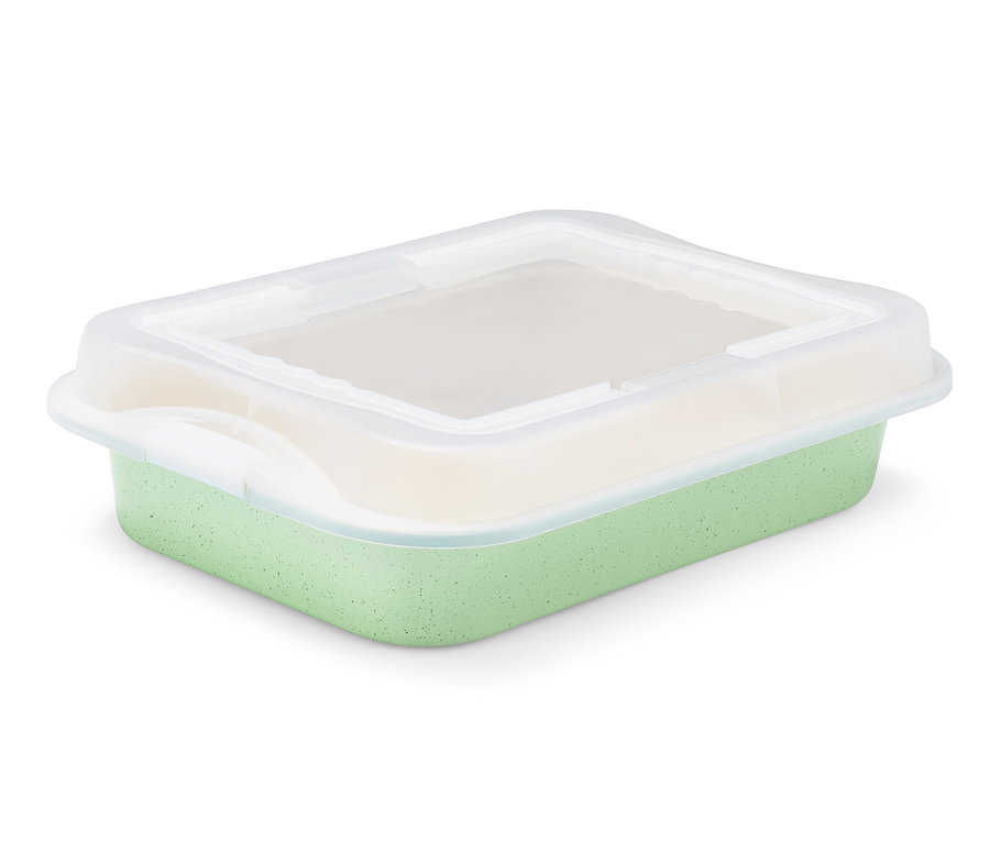 Zielona blacha do pieczenia z przezroczystą pokrywką.