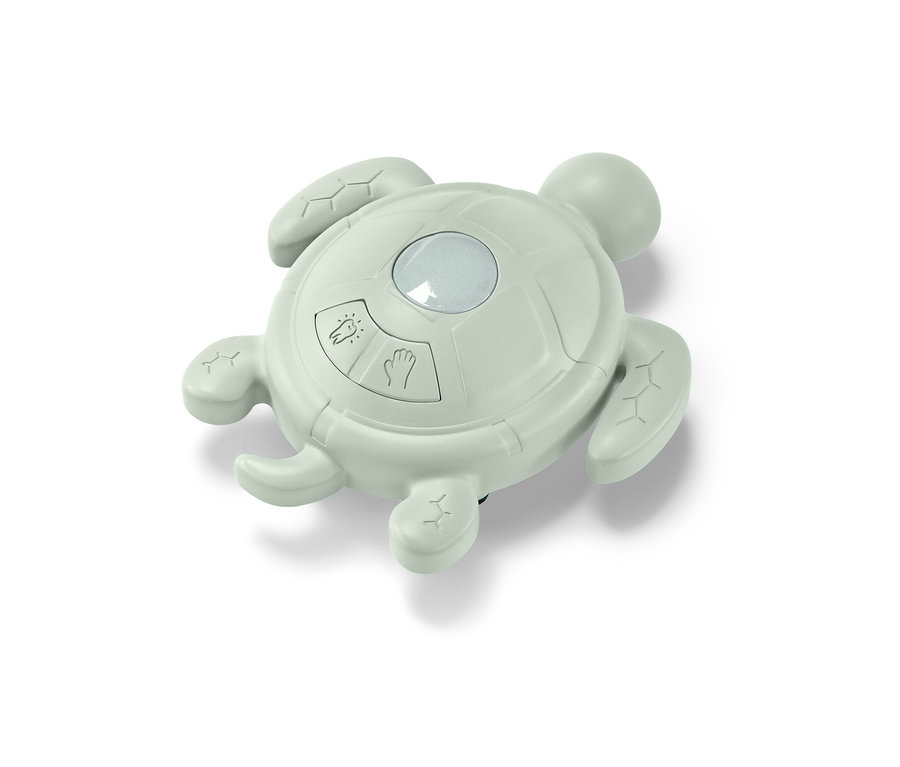 Zielony minutnik do mycia rąk i szczotkowania zębów w kształcie żółwia.