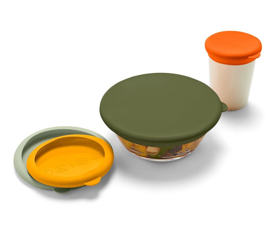 Zestaw 4 silikonowych pokrywek do utrzymywania świeżości w różnych kolorach na białym tle.