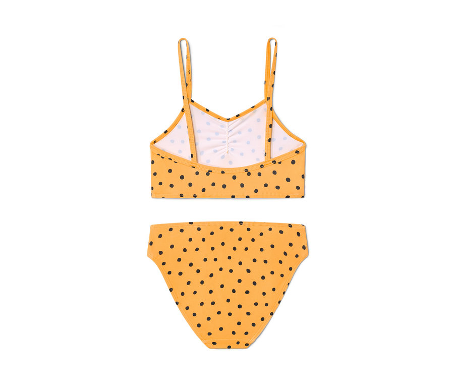 Żółty 4-częściowy zestaw bikini w czarne kropki.