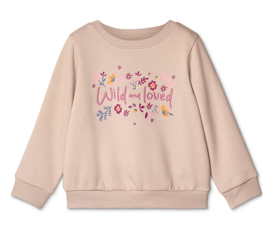 Beżowa bluza z napisem „Wild and loved” i motywami kwiatowymi na białym tle.