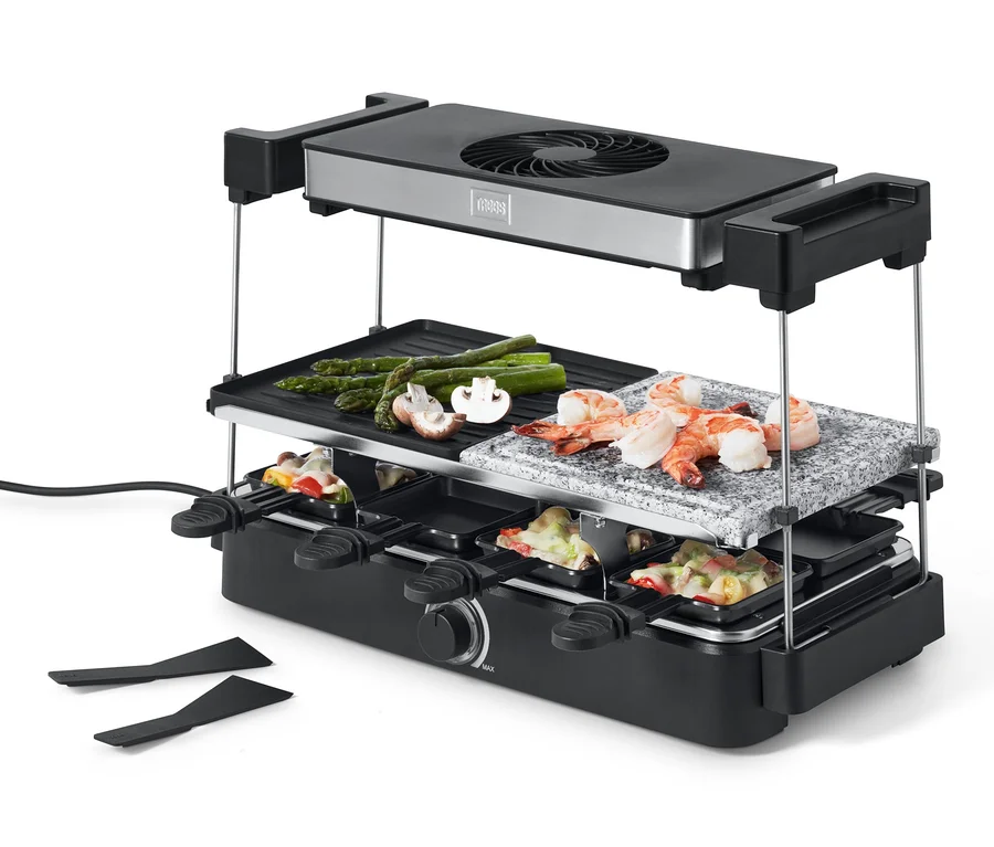 Raclette Trebs z okapem i płytą kamienną z krewetkami, szparagami i pieczarkami.