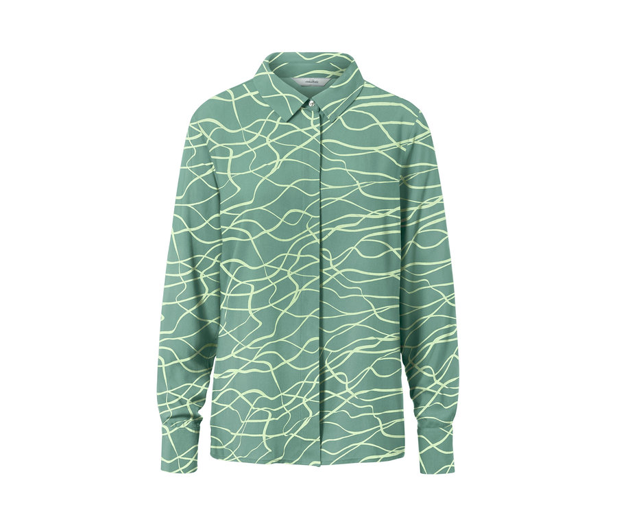 Zielona bluzka z nadrukiem.