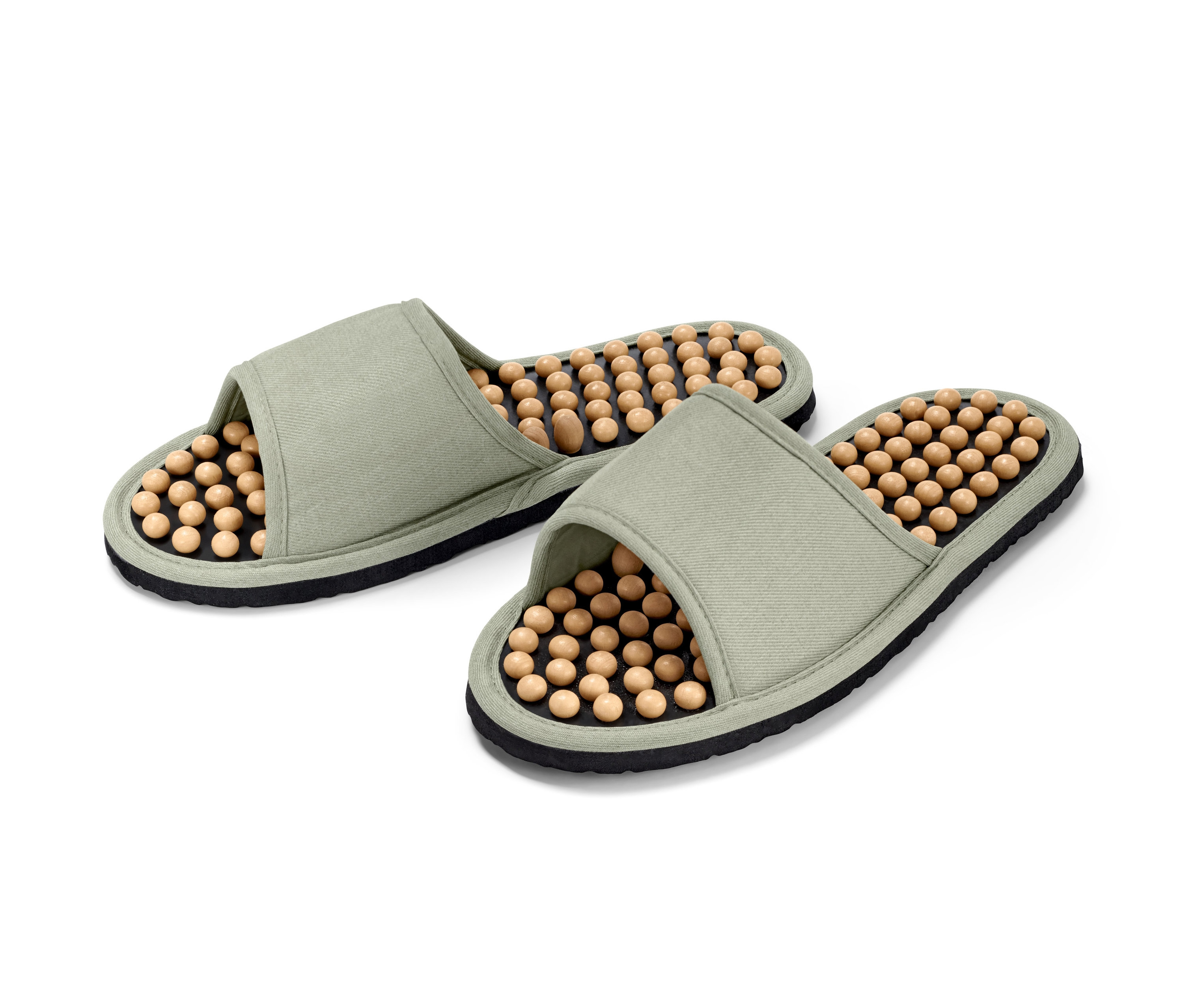 Dwa jasnozielone klapki z efektem masażu z drewnianymi elementami masującymi.