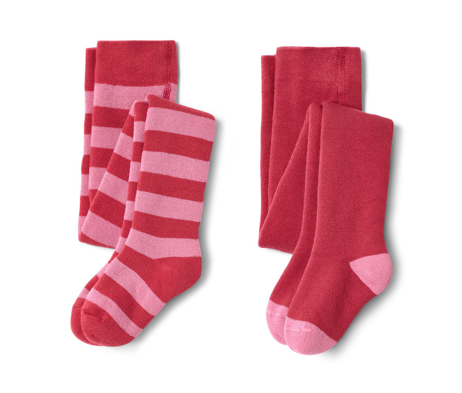 Dwie pary czerwonych rajstop termicznych.