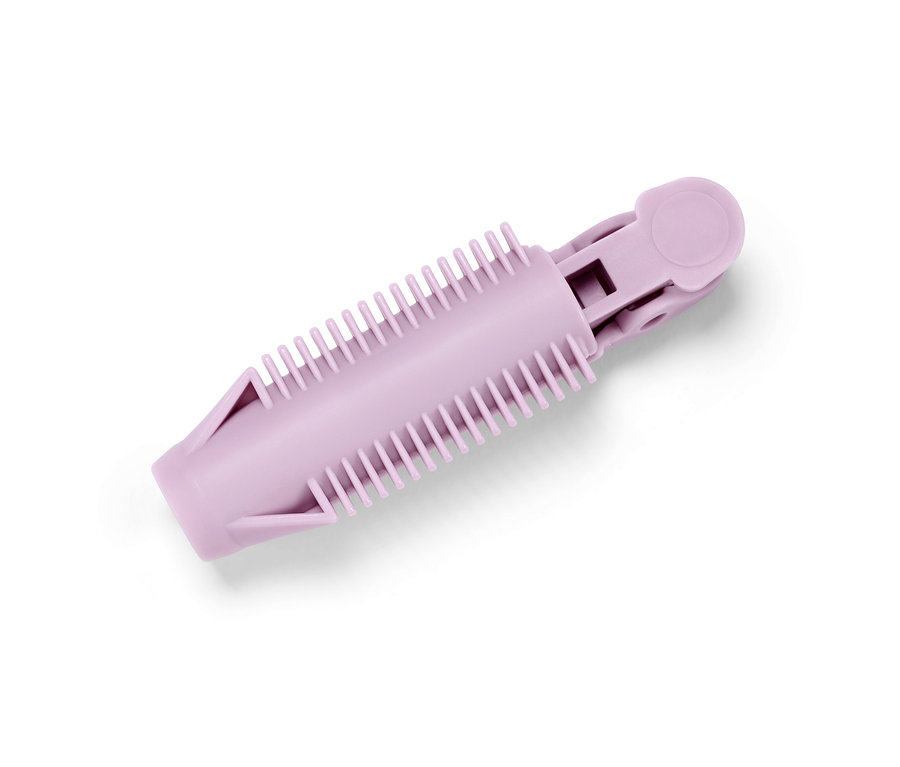 Zbliżenie na różowe klipsy do zwiększania objętości włosów u nasady, 6 sztuk.